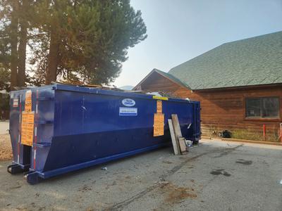 Rolloff dumpster in Town Hall parking lot