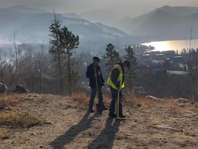 Staff gazes at smoky view in aftermath of wildfire